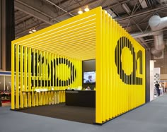 a yellow room divider with speakers on it