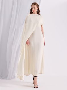 WF ATELIER Off White Two-piece Dress and Cape, you can style separately with different outfıt Model height: 177 CM 100% Viscose Length: 137 cm Cape Long sıde :145 cm Pre-draped Cape Evening Dress, Fitted Cape Maxi Dress For Wedding, Wedding Cape Maxi Dress Fitted, Spring Wedding Dresses With Cape Sleeves, Elegant Fitted Cape Dress, Summer Wedding Dress With Cape Sleeves, Pre-draped Maxi Dress With Cape Sleeves For Wedding, Formal Fitted Cape Dress, Elegant Spring Maxi Dress With Cape