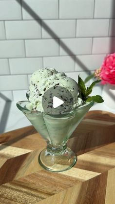 an ice cream sundae in a glass bowl