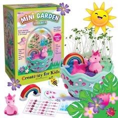 an image of a toy set in the grass with flowers and rainbows on it