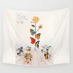 a wall hanging on the side of a white wall with butterflies and flowers growing out of it