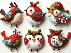 six birds decorated with christmas decorations on top of a white surface, one is red and the other is green