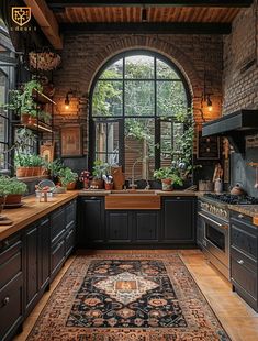 a large kitchen with an ornate rug in front of the sink and stove top oven