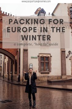 a woman standing in front of a building with the words packing for europe in the winter