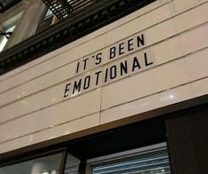 a sign that says it's been emotional on the side of a building