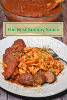 the best sunday sauce for pasta and meat is in this bowl with spaghetti on it