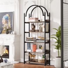 a living room with a fireplace and bookshelf in the corner on the floor