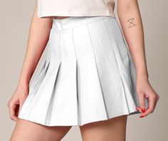 This cute skort by Made By Johnny is perfect for tennis, long walks, or even your school uniform. It comes in both solid colors and plaids, easy to coordinate for any outfit or any cosplay! You'll love the inner shorts which also feature a side pocket to hold your phone. The skort is easy to put on with a 2 inch side zipper. Pleated skort with inner shorts Shorts lining feature side phone pocket Great for active lifestyles Long Walks, Johnny Was, Active Lifestyle, Side Pocket, Put On, Side Zipper, Solid Colors, High Waisted Skirt, Tennis