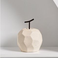 Adorn your space with our Geometric Apple Ceramic Ornament. Its sleek design and ceramic finesse bring elegance to any room. Perfect for home or office, it's a unique gift that expresses your sophisticated taste. Order now and enhance your decor! Latitude Run® | Latitude Run® Terena Decorative Object 5.51 H x 4.33 W x 4.33 D in brown / Porcelain / Ceramic in White | 5.51" H X 4.33" W X 4.33" D | Wayfair | Home Decor Unique Bookshelves, Modern Luxury Living Room, Fruits Decoration, Ceramic Apple, Living Room Tv Cabinet, Vase Display, Gorgeous Centerpieces, Tissue Case, Fruit Decorations