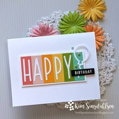 a happy birthday card with flowers on it