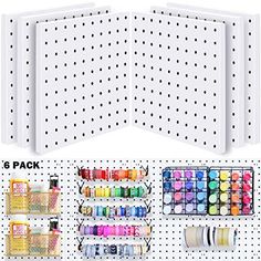 the pegboard wall is organized with different supplies