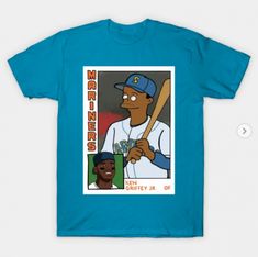 a blue t - shirt with an image of a baseball player holding a bat