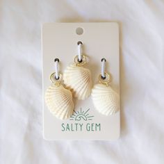 Add wave-making fun to your braids with our Shell Hair Charms! These seashell-shaped accessory clip to your hair for a touch of vacay vibes all year round. 3-pack shell removable charm 14k gold PVD Plated Hypoallergenic 6mm Hoop Tarnish Resistant Water Resistant *each shell is natural and may vary slightly in color and design. Hair Charms, Vacay Vibes, High Hair, Charm Rings, Gift Card Sale, Cool Things To Make, Sea Shells, Braids, Water Resistant