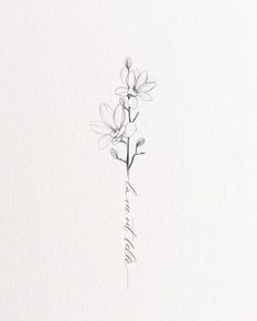 a drawing of some flowers on a white paper with the word love written in cursive writing