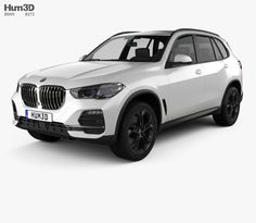 a white bmw suv is shown in this image