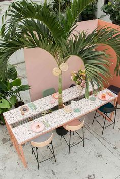 the table is set with plates and place settings for two people to sit at it