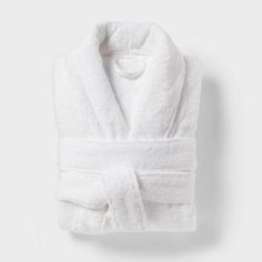 Make every day feel like a spa day by wrapping yourself in this Spa Plush Bath Robe from Threshold™. Crafted from 100% terry cotton and featuring a plush design, this V-neck bathrobe feels soft against your skin as you bundle up after a shower. Designed in a solid white hue, it features an open-front design with a shawl collar for easy on and off. A front tie with belt loops offers you a customizable fit, while two large front pockets come in handy for keeping your phone or grooming essentials c Terry Cloth Bathrobe, Black Flower Dress, Terry Robe, Plush Design, Target Gifts, One Piece Clothing, One Piece Pajamas, Sewing Party, Shawl Collar