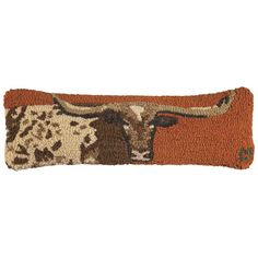 a long horn steer hooked up to a door mat on a white background with an orange border