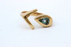 This ring is truly a unique piece and as an edgy vibe perfect for the coolest gal you know!  The ring started out carved in the wax, then was cast in beautiful 10k gold and set with an shield cut aquamarine. The stone was selected especially for this piece, and is truly one-of-a-kind. Triangle Stone Ring, Bow And Arrow Ring, Ring With Triangle Stone, Arrow Rings Silver, Arrowhead Ring, Arrow Ring, Wax Carving, 10k Gold, Aquamarine