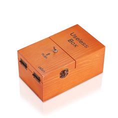 an orange wooden box with two keys on it