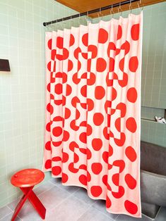 A red and salmon colored terry cloth shower curtain with circle and square shapes by Dusen Dusen hung in a sage green tile bathroom.  A red stool sits to the left of the curtain. Red Shower Curtains, Tiger Home, Dusen Dusen, Dream Shower, Pink Bathroom, Shower Liner, Kids Bath, Colorful Curtains, Paper Towel Holder