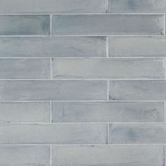 a close up view of a gray brick wall