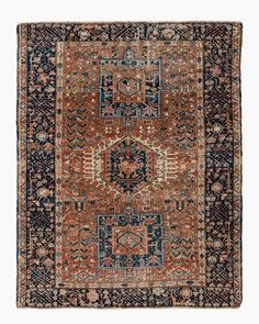 an antique rug with blue and red colors