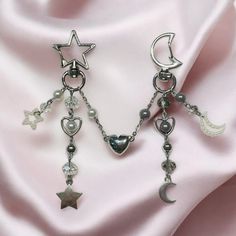 Celebrate the magic of the cosmos with this star and moon charm magnetic connecting keychain, a perfect accessory for Y2K style enthusiasts. Designed with a celestial theme, this unique keychain set features a star and a moon charm that magnetically connect, symbolizing the perfect union of opposites. The intricate details and shiny finish make it a standout piece that adds a touch of cosmic elegance to your keys, bags, or phone. Whether you're gifting it to a loved one or keeping it as a person Keychain Y2k, Celestial Theme, Unique Keychain, Couples Accessories, Unique Keychains, Star And Moon, Key Accessories, Keychain Set, Star Moon