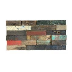 a wall made out of wooden planks with different colors and patterns on it's sides