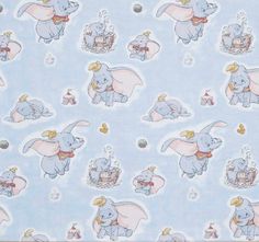 an elephant and piggie pattern on a blue background