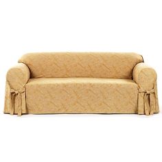 an image of a couch that is in the living room with it's cover