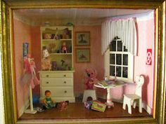 a doll house with furniture and toys in it