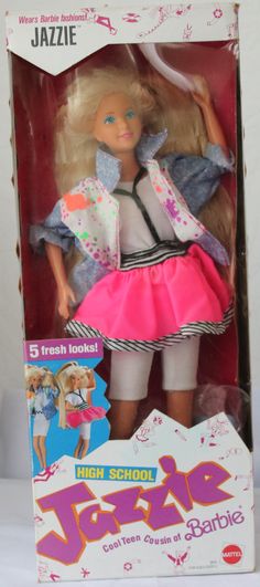 a barbie doll in a box with clothes and accessories on it's back side