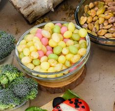 several bowls filled with different types of food