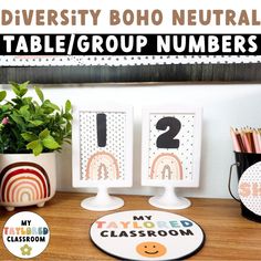 the table is set up for two groups of students to learn how to use numbers