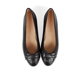 This pair of CC Ballet flats are in dark navy blue lambskin, with an embossed "CC" logo toe cap, tie front, tonal stitching, and black leather soles. Origin: ItalyCondition: New and never wornAccompanied by: Damaged Chanel box, Two shoe dustbagsSize: 37 EU Shoe Png Aesthetic, Black Chanel Ballet Flats, Ballet Flats Chanel, Chanel Ballet Flats Black, Black Chanel Flats, Girls Weakness, Chanel Black Flats, Asymmetrical Face, Channel Shoes