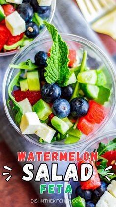 watermelon salad with feta cheese and blueberries in a glass bowl on a wooden table