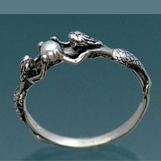 Sterling Silver .925 Stamped. Believed To Be Sterling Plated Rather Than Solid Sterling. Mermaids With Ball (Pearl) Ring. Pearl Is Faux. Full Disclosure ! Love This Ring! It's So Cute! U Can Put Clear Nail Polish On It So It Lasts Longer And If U Are Sensitive To Metals This Also Helps Stop Irritation. Buy2 Get 3rd Free!! 5 Or More Gets 30% Order. Two Mermaids, Ring With Pearl, T S Eliot, Mermaid Ring, Ring Pearl, Gold Diamond Wedding Band, Sparkling Rings, Morganite Ring, Silver Jewelry Rings