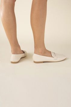 Put your feet up in style with the Harriet Loafers. These classic casual flats offer a comfortable and trendy alternative to heels. With a playful, relaxed tone, these simple yet chic flats are perfect for any casual occasion. Loafers fit true to size Spring Workwear Slip-on Moccasins, Beige Low Heel Loafers For Spring, Elegant Everyday Slip-ons With Flat Heel, Business Casual Slip-on Flats With Textured Sole, Trendy Flat Heel Slip-ons For Work, Spring Business Casual Slip-ons With Cushioned Footbed, Business Casual Cushioned Slip-on Flats, Spring Business Casual Flat Slip-ons, Casual Pointed Toe Slip-ons With Cushioned Footbed