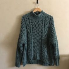 Super Chunky Thick Sweater In Beautiful Green Color. In My Opinion Fits Oversized On Its Medium Size. Very Cozy And Will Keep You Warm. I Only Tried It On, Still With Tag, New. Chest Across Unstretched Is 24” Length Is 24” Unstretched. Will Easily Fit Large. Dark Green Knit Sweater Outfit, Cozy Cable Knit Acrylic Sweater, Cozy Chunky Knit Acrylic Tops, Casual Turtleneck Chunky Knit Pattern, Oversized Chunky Knit Winter Sweater, Chunky Knit Tops, Winter Chunky Knit Top One Size, Chunky Knit Winter Top, Casual Knitting Pattern For Cold Fall Weather