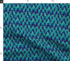 an image of a blue and green fabric with small circles on it, as well as the