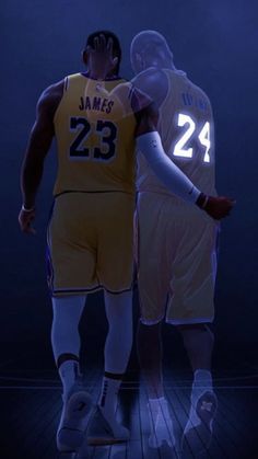 two basketball players standing next to each other