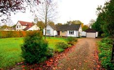 before and after photos of a home's driveway