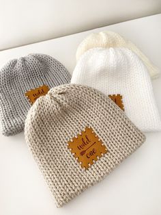 "WILD ONE Beanie! A great gift for a baby shower or for your own new baby... *This hat comes in a white, cream, parchment & Grey *Double layered for warmth *newborn size to 1-3 yrs *made of an acrylic yarn  *pompom is on a snap to make washing easier *handwash * * the current turnaround time is 1-3 days*  Newborn hat: measures 12\" diameter X 6\" tall 3-6 months: measures 12\" diameter X 7\" tall 6-12 months: measures 12\" diameter X 8\" tall 1-3 yrs: measures 13\" diameter x 9\" tall Sizing: 0-3 Months (12\"-14\" around) 3-6 Months (14\"-16\" around) 6-12 Months (16\"-18\" around) These hats are very stretchy and will fit as baby grows! These would be adorable for newborn photos, for your family photoshoot, or just for daily wear! Hand wash Lay flat to dry Acrylic yarn Will refund any shi White Handmade Hats For Birthday, Cute Cream Hat For Gift, White Beanie Bonnet As A Gift, White Bonnet Gift, One Size Fits Most, White Bonnet Gift (one Size Fits Most), White Bonnet, One Size Fits Most, Gift, Handmade White Crochet Hat For Gift, Personalized White Hat As Gift, Handmade White Bonnet As A Gift