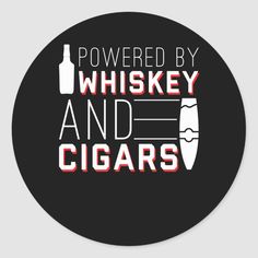 powered by whiskey and cigars sticker on a round black background with red lettering