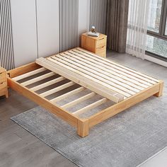 a bed with wooden slats is shown in front of a window and rug on the floor