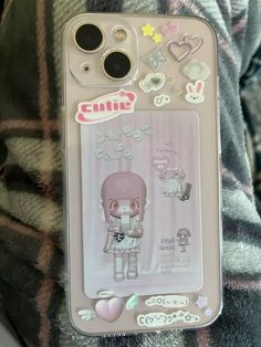 a cell phone case with some stickers on it