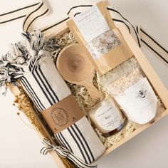 This luxurious spa experience with our Radiant Glow Spa Gift Box. This curated gift set comes beautifully packaged in a wood keepsake box with a wooden scoop for easy bath milk dispensing. Pamper her with the indulgent honey and oatmeal bath milk soak, and wrap comfortably with the soft, absorbent, striped Turkish towel. She can unwind and de-stress with the calming chamomile bath salts while enjoying the soothing ambiance of the Vintage Timbers Rain candle spa. Give the gift of relaxation and r Rain Candle, Milk Bath Soak, Tub Tea, Bath Milk, Oatmeal Bath, Wood Keepsake, Wood Keepsake Box, Oatmeal Milk, Bath Tea