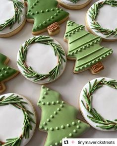 christmas cookies decorated with green and white icing