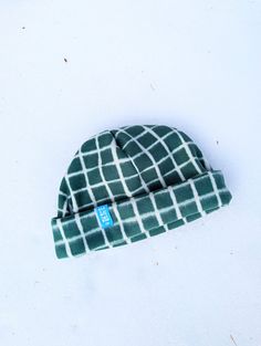 This is the simple version of our beanie. Perfect for active sport with style, fits under a ski helmet ;)  The ultimate fleece beanie for the ultimate look! With its fun and playful look, it's sure to keep heads turning with its unique style. Full fleece, simple fit. Rib can be adjusted for different styles. Emerald green and white lines. Made in Quebec with love and fun! Cool Beanies, Fleece Beanie, Outdoorsy Style, Beanie Fits, Ski Helmet, Surfer Style, Simple Fits, Cool Hats, Skull Cap Beanie